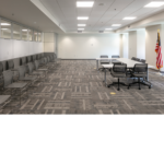 Meeting room with white tables in the State of NM TIWA Building